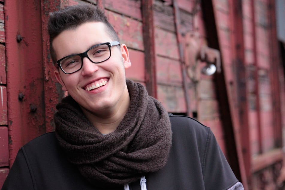 Portrait of a Happy Handsome Young Man